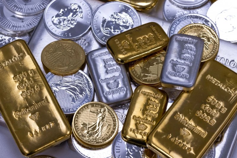 Gold and silver prices climb on global markets
