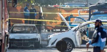 At least 6 killed as militants torch 2 passenger vehicles in Pakistan