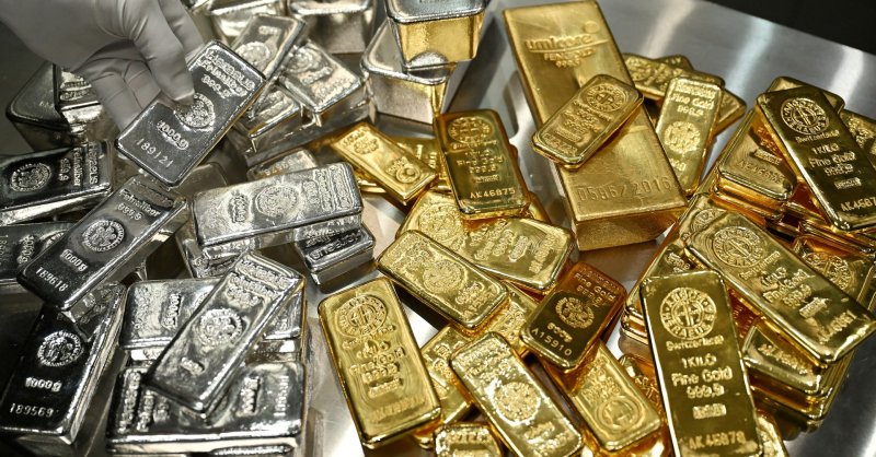 Gold and silver retreat amid market pressure