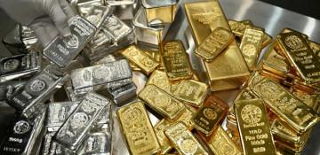 Gold and silver retreat amid market pressure