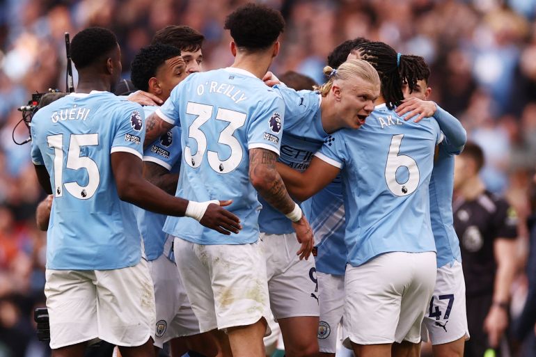 Manchester City close gap on Arsenal with 2-1 win