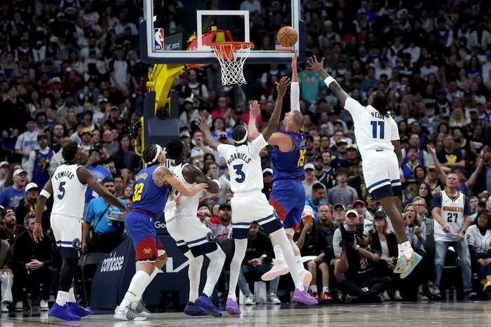 Timberwolves stun Nuggets with comeback playoff win