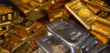 Gold, silver prices slide amid global market moves