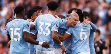 Manchester City close gap on Arsenal with 2-1 win