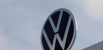 Volkswagen warns of more cost cuts as profits plunge