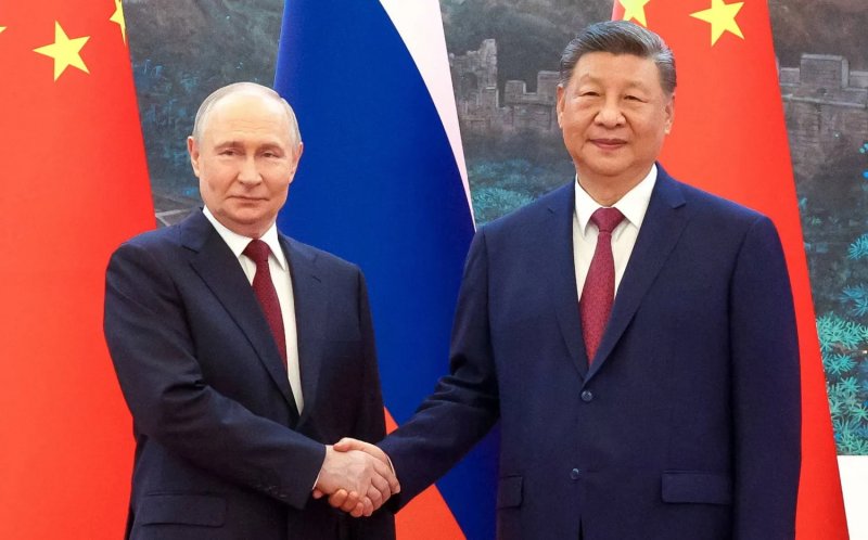 Xi, Putin hold talks in Beijing