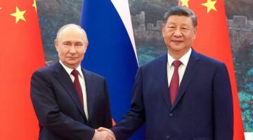 Xi, Putin hold talks in Beijing
