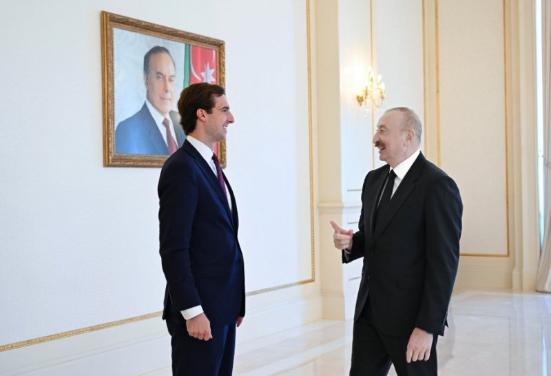 President Ilham Aliyev shows commemorative gift from Trump to U.S. Assistant Secretary of State