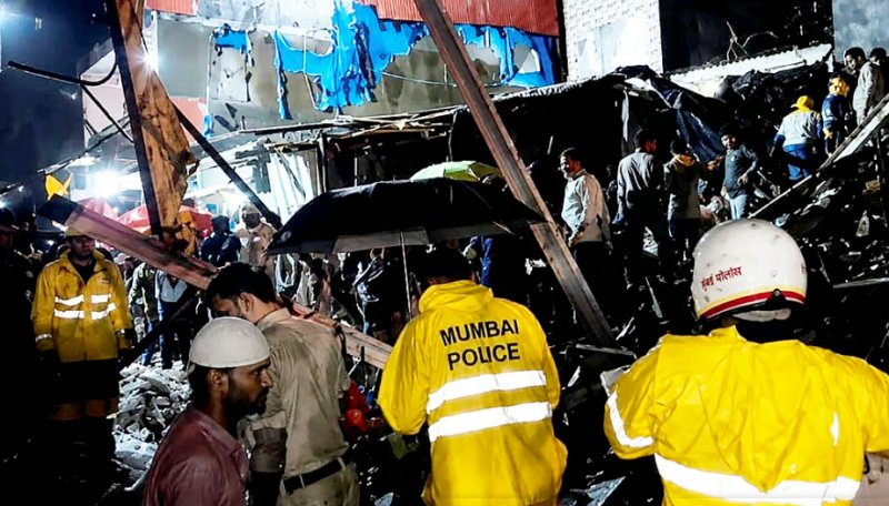 At least 6 killed after heavy rains trigger building collapse in Mumbai