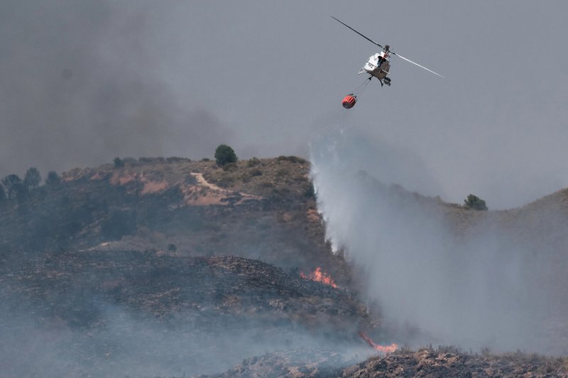 At least 12 killed, 23 missing in forest fire in southern Spain