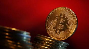 Bitcoin climbs above $71,000 for first time since June