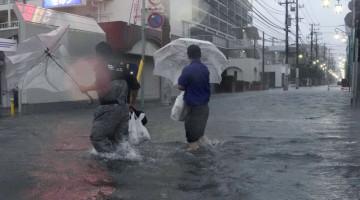 Typhoon Dujuan leaves nine dead, four missing in Japan